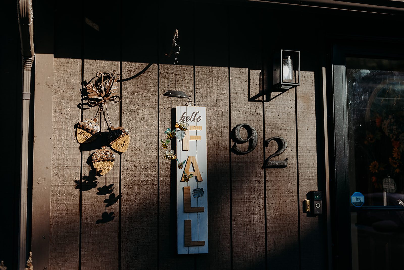 Details of a door decorated with a fall sign