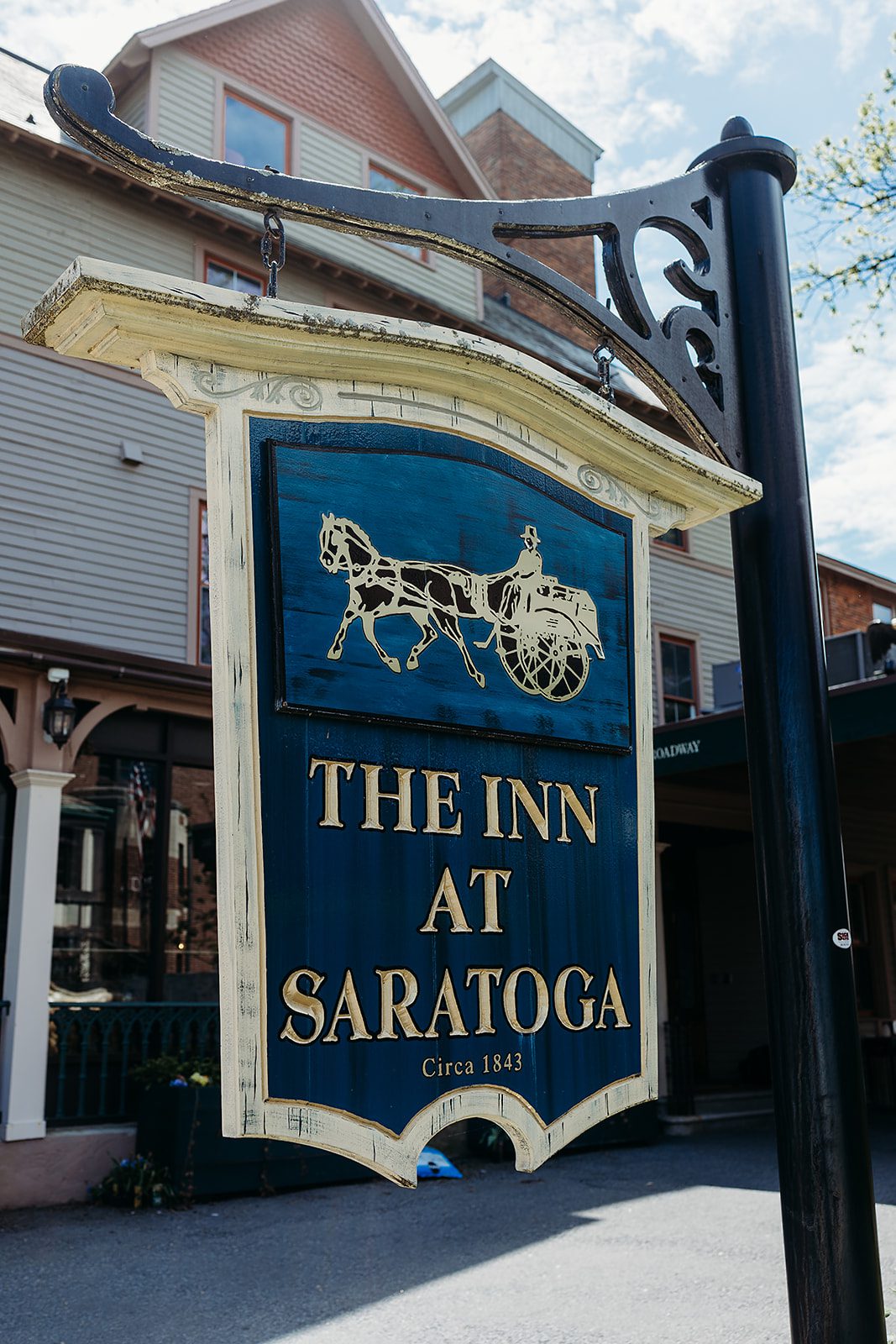 Details of the wooden front sign of The Inn At Saratoga Wedding venue