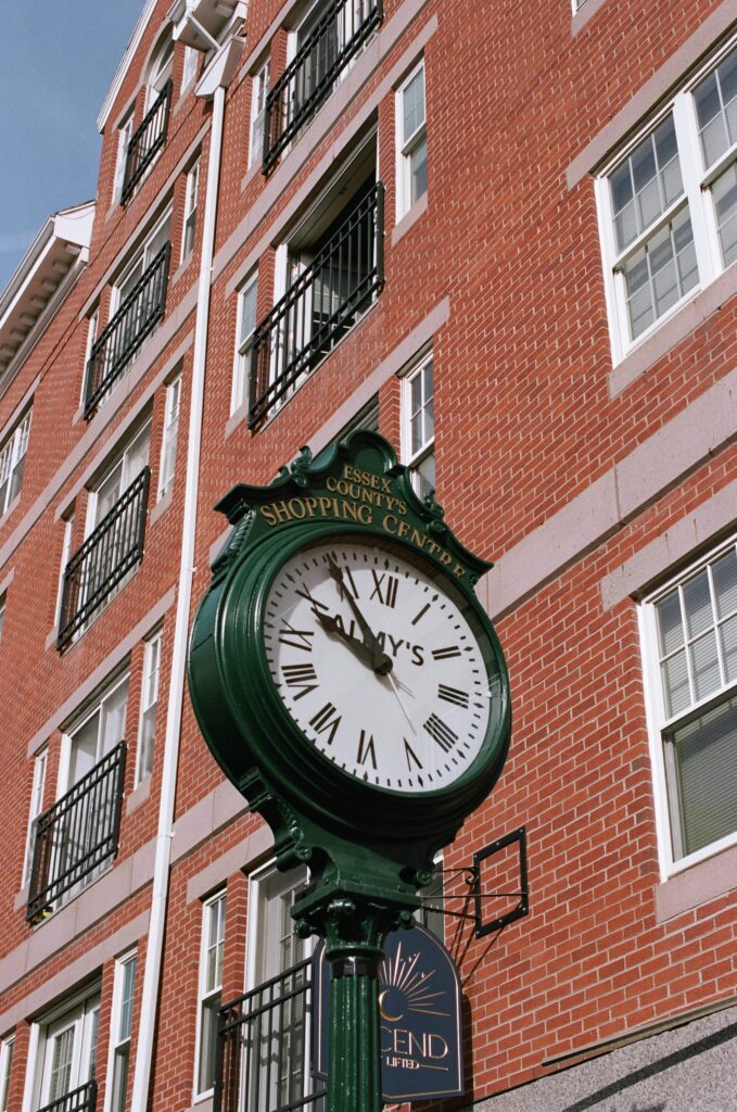 An antique clock shows the time.