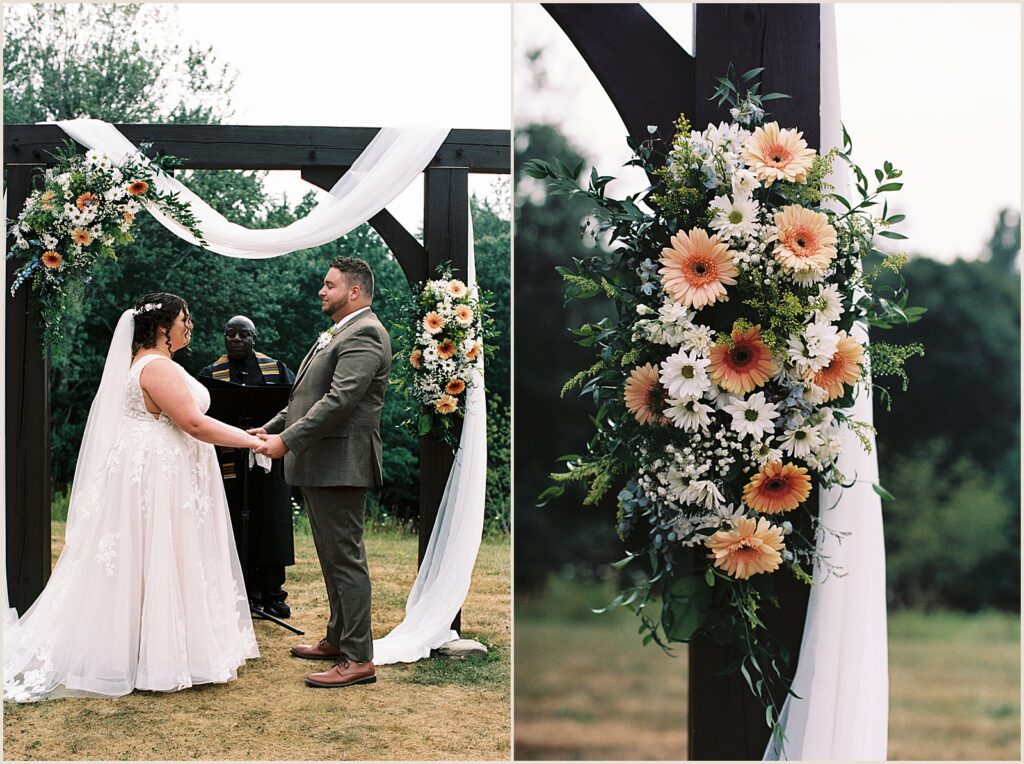 Orange, blue, and white flowers decorate a wooden arch in a film wedding photo.