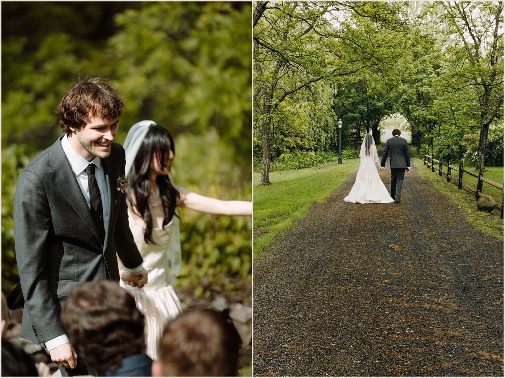 A bride and groom walk down a gravel road holding hands.