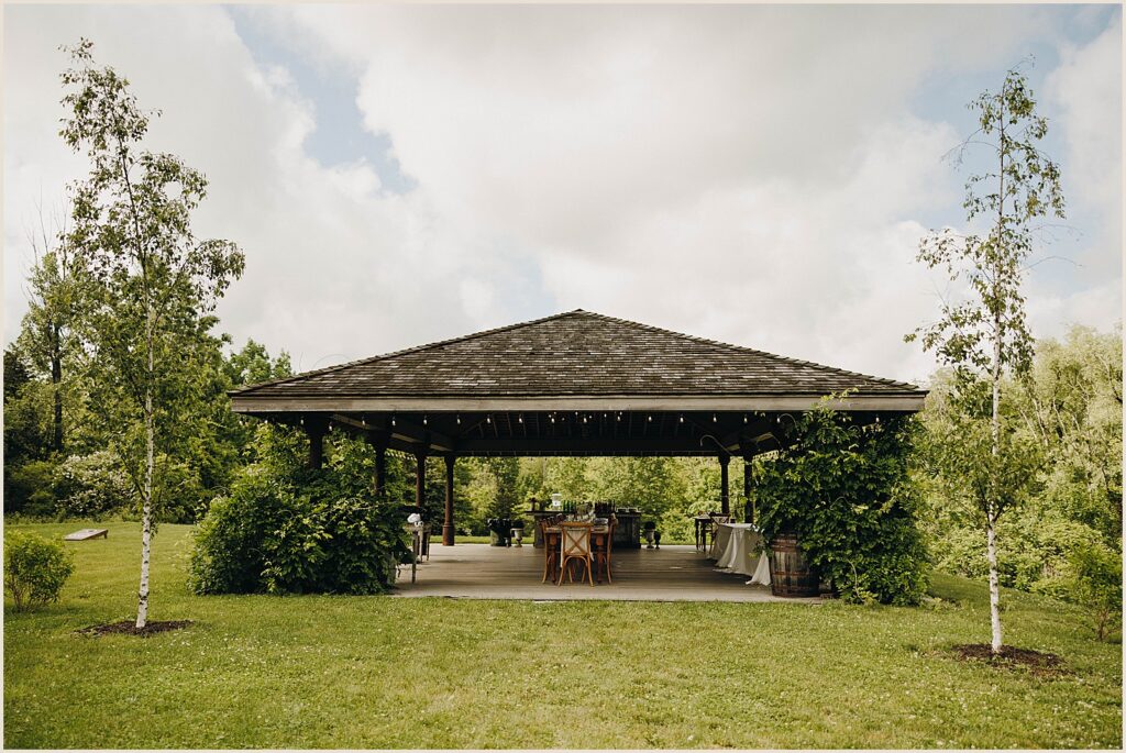A pavilion is set up for a wedding reception at Windrift Hall.